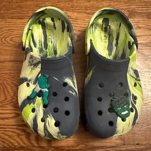 Boys size 13 green and blue tie-dye Crocs with Hulk jibbitz